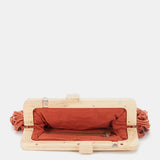 Orange macramé clutch