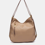 Bolso multifuncional trenzado en beige