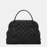Schwarze gesteppte Handtasche.