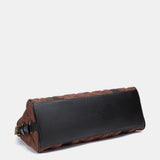 Gesteppte Handtasche in Braun.