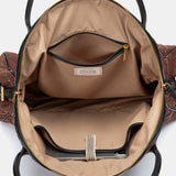 Gesteppte Handtasche in Braun.
