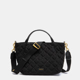 Black quilted shopper bag.