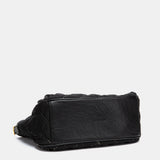 Black quilted shopper bag.