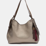 Bolso de hombro con borla ocre