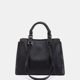 Schwarze Handtasche.