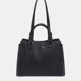 Schwarze Handtasche.