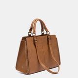 Cognacfarbene Handtasche.