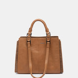 Cognacfarbene Handtasche.