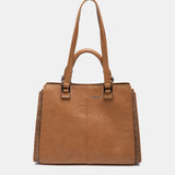 Cognacfarbene Handtasche.