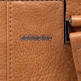 Cognacfarbene Handtasche.