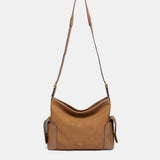 Bolso de hombro multibolsillos ámbar