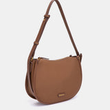 Bandolera en materioales reciclados cognac