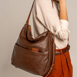 Bolso multifuncional en materiales reciclados marrón