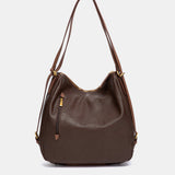 Bolso multifuncional en materiales reciclados marrón