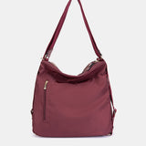 Bolso multifuncional en materiales reciclados burdeos