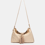 Bolso de hombro con borla beige