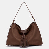 Bolso de hombro con borla marrón