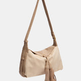 Bandolera con borla beige