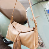 Bandolera con borla beige