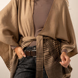 Brown poncho with a bow.