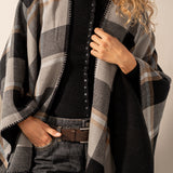 Reversible black poncho.
