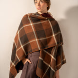 Reversible poncho in burgundy.