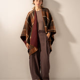 Reversible poncho in burgundy.