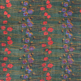 Wool scarf with a green floral print.
