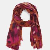 Wollhalstuch mit abstraktem Bordeaux-Muster.