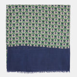 Viscose scarf with a blue geometric print.