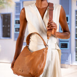 Kleine Umhängetasche aus cognacfarbenem Leder