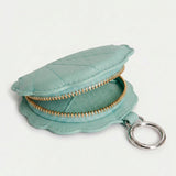Llavero charm concha en piel turquesa